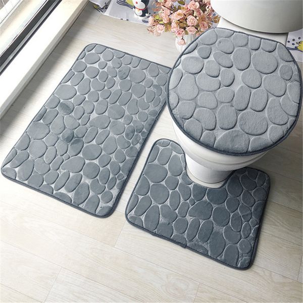 3-piece bath mat set with non-slip cobblestone design, includes 2 rugs and a toilet lid cover for absorbent bathroom flooring