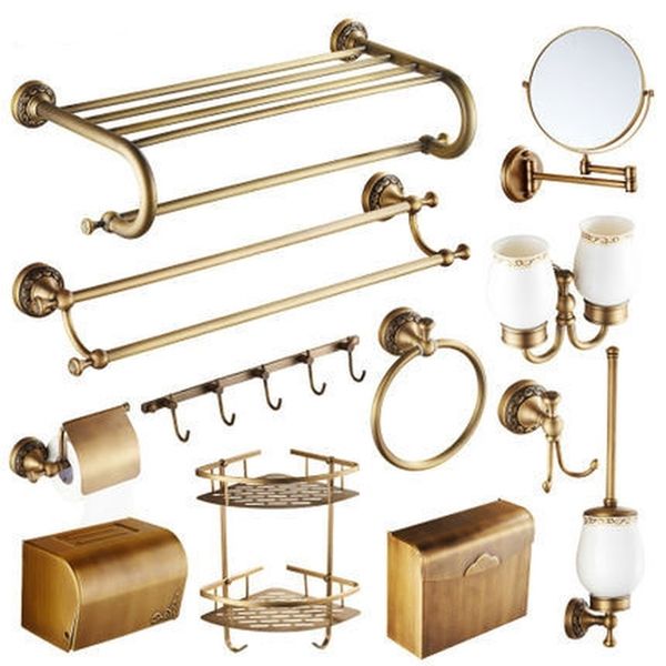 Antique brass wall-mounted towel rack with carved design, a versatile bathroom hardware set for various decor styles
