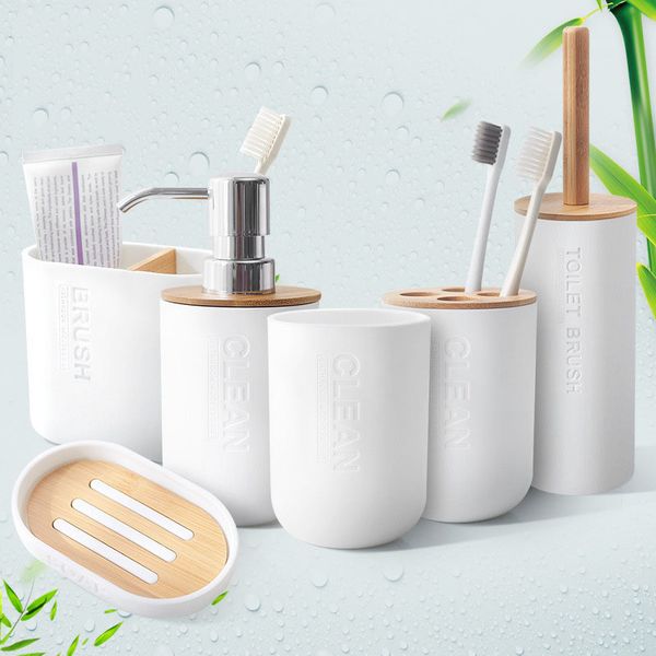 bamboo bathroom accessories set including toilet brush, toothpaste holder, toothbrush cup, soap dispenser, and dishware
