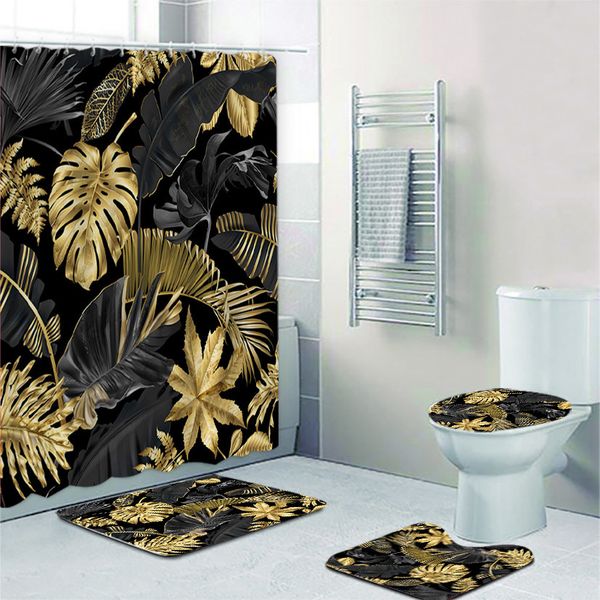 Black and gold tropical palm leaf shower curtain set with matching bath mats for exotic bathroom decor