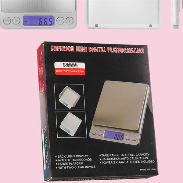Compact digital kitchen scale with 0.01g precision, ideal for jewelry and baking, featuring LCD display and retail packaging, max capacity 500g