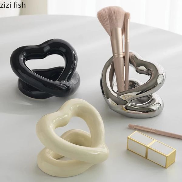 Creative heart-shaped ceramic toothbrush holder for bathroom organization and makeup brush storage