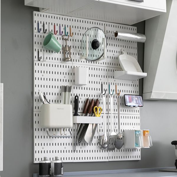 DIY pegboard shelf for hanging bathroom accessories without drilling, ideal for garage or kitchen organization