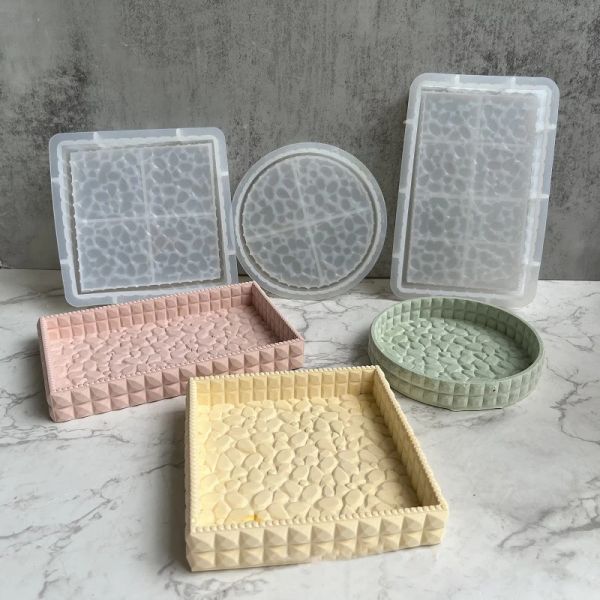 DIY silicone molds for concrete trays in rectangular and round shapes, ideal for resin crafts, plant pot bases, and plaster projects