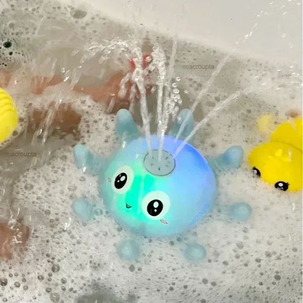 Electric whale bath ball with LED light and music for kids' bathtub fun