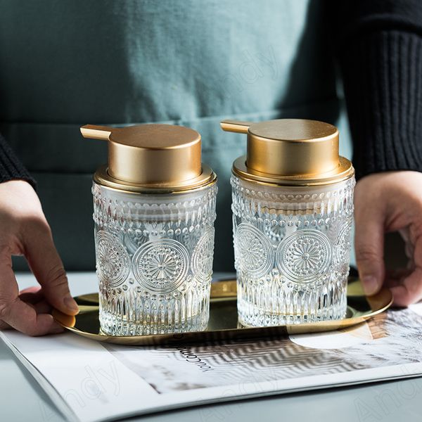 European-style glass bottle liquid soap dispenser with gold accents, modern decorative desktop shampoo press set for elegant bathroom decor