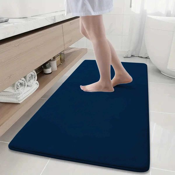Large anti-slip bathroom floor mat measuring 19.7x47.2 inches, ideal for bathtub areas with water-absorbent home decor features