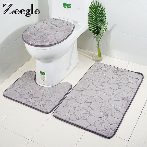 Memory foam bath mat for shower, toilet, and bathroom floor with embossed design