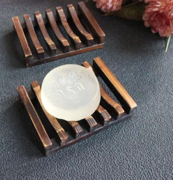 Natural bamboo wooden tray for dish and soap storage in bathroom or shower