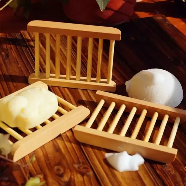 Natural wooden tray for holding soap and bath essentials in the shower or bathroom