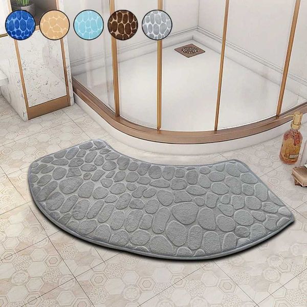Non-slip curved bath mat with absorbent pebble texture for shower and toilet areas