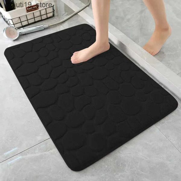 Non-slip pebble-textured bath mat with memory foam for shower and bathtub areas