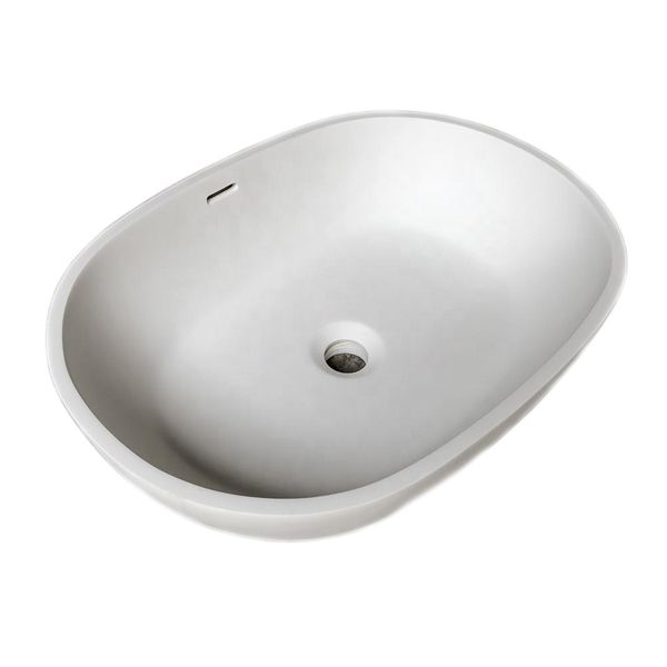 Oval bathroom countertop sink made of Corian solid surface resin for cloakroom vanity