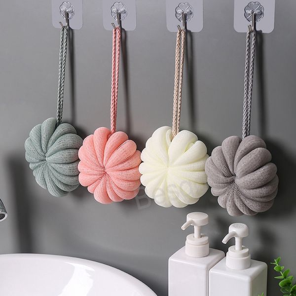Pumpkin-shaped mesh bath sponge for exfoliation and showering