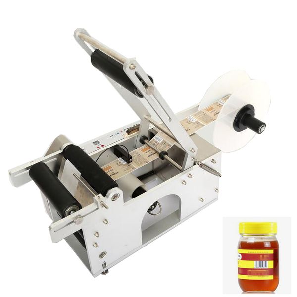 Semi-automatic round bottle labeling machine featuring date printing and self-adhesive label dispensing
