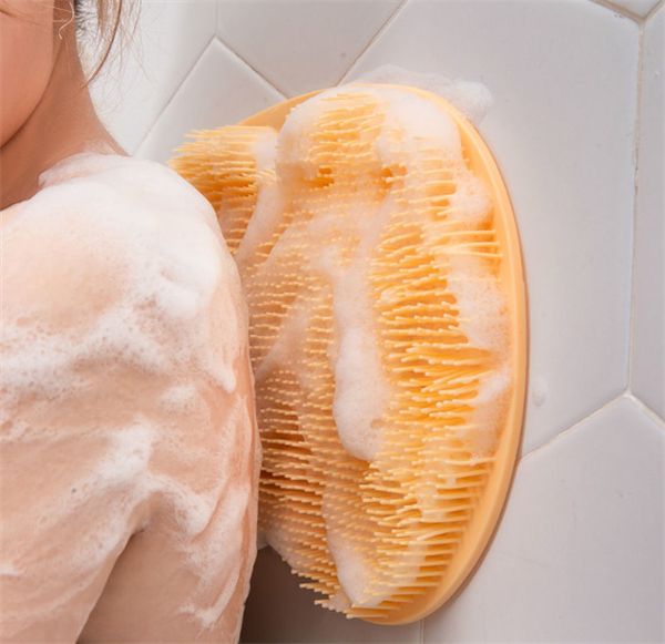Silicone exfoliating shower brush for body and foot scrubbing, with non-slip bath mat design