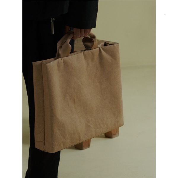 Spacious unisex laptop bag with crossbody strap, fits 14-16 inch devices including Apple and Huawei