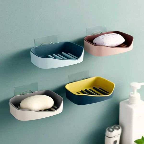 Wall-mounted adhesive soap dish with drainage for bathroom storage