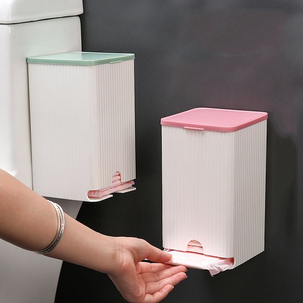 Wall-mounted bathroom holder for paper towels, sanitary napkins, and cotton swabs