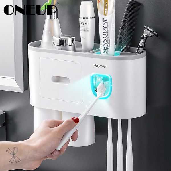 Wall-mounted bathroom set with automatic toothpaste dispenser and toothbrush holder
