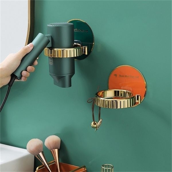 Wall-mounted hair dryer holder for organized bathroom storage and tool access