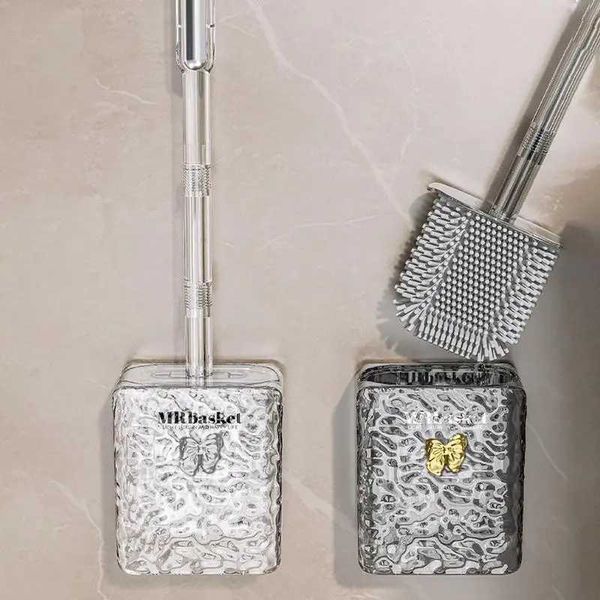 Wall-mounted toilet brush holder with long handle, drainage holes, and stylish bathroom decor design