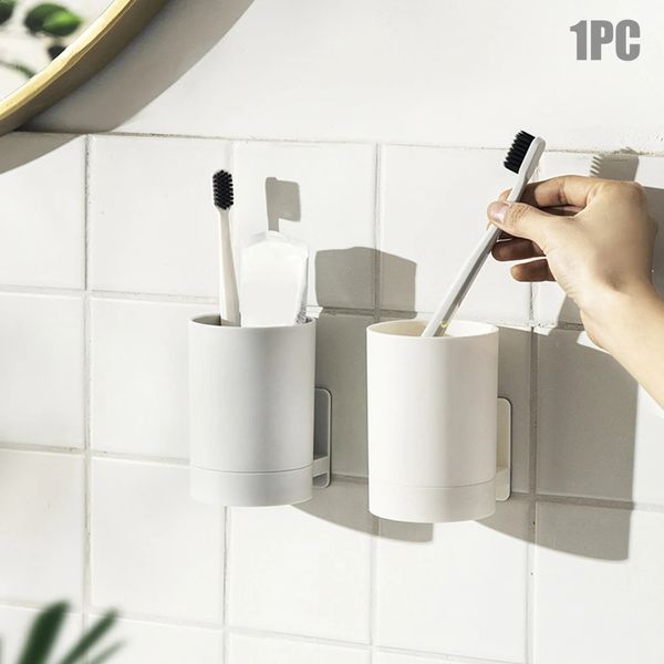 Wall-mounted toothbrush holder with toothpaste and cup storage, no-drill bathroom shelf for organizing