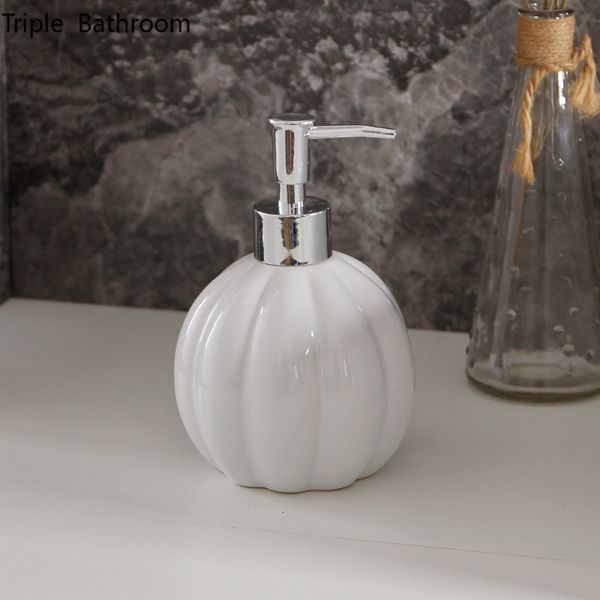 White ceramic pumpkin-shaped liquid soap dispenser for travel and bathroom use, holds 400ml of shampoo or lotion