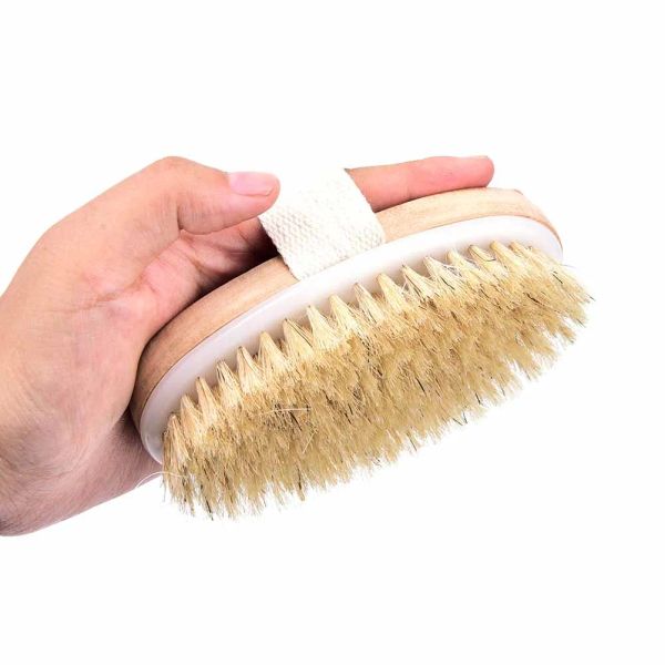 Wooden bath brush with natural bristles for gentle exfoliation and dry skin care during showers or spa treatments